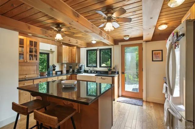 a view of a living room with a large window