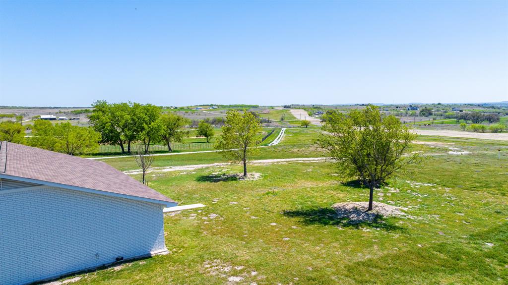 642 Fm 3200 Comanche, TX 76442 - Photo 35 of 37 a view of a yard with a swimming pool