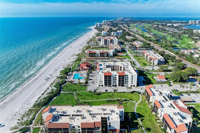 a view of building and an ocean