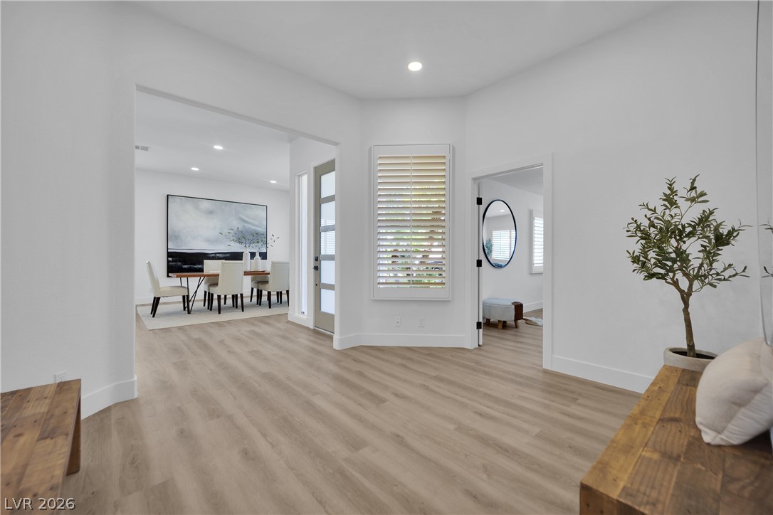 8981 Rivers Edge Drive Las Vegas, NV 89117 - Photo 24 of 69 Clean lines and a spacious layout define this modern living space, extending to a bright dining area.