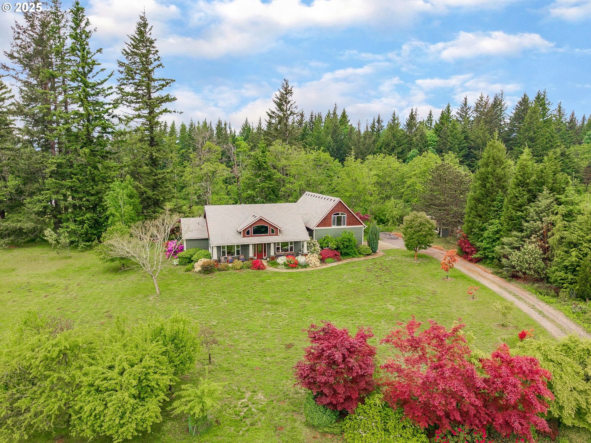 72 Patrick Lane Washougal, WA 98671 - Photo 1 of 48 a front view of a house with a yard and fountain