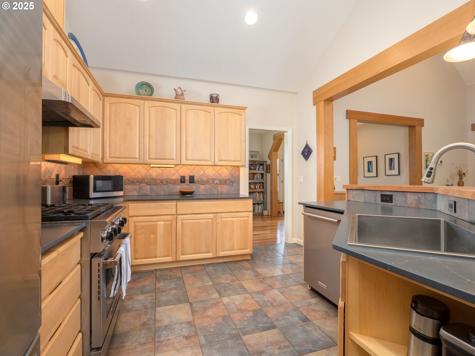 72 Patrick Lane Washougal, WA 98671 - Photo 19 of 48 a kitchen with a sink cabinets and stainless steel appliances