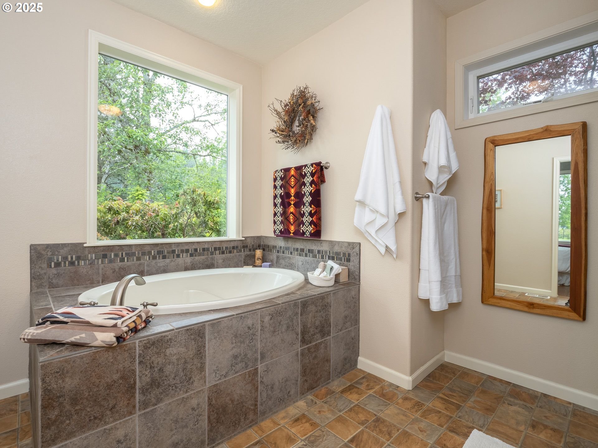 72 Patrick Lane Washougal, WA 98671 - Photo 27 of 48 a bathroom with a tub sink and mirror
