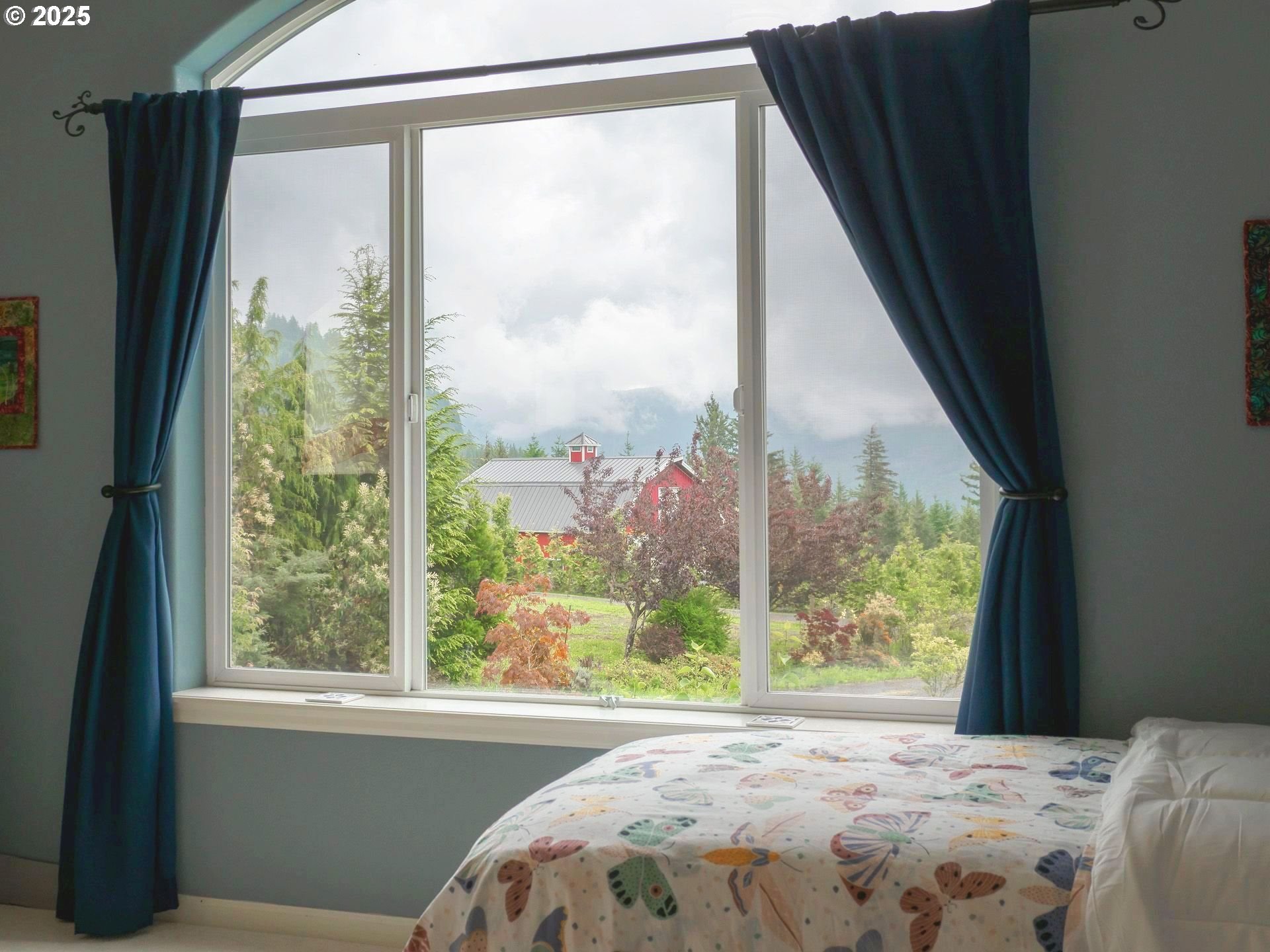 72 Patrick Lane Washougal, WA 98671 - Photo 32 of 48 a view of a bedroom with a bed and a window