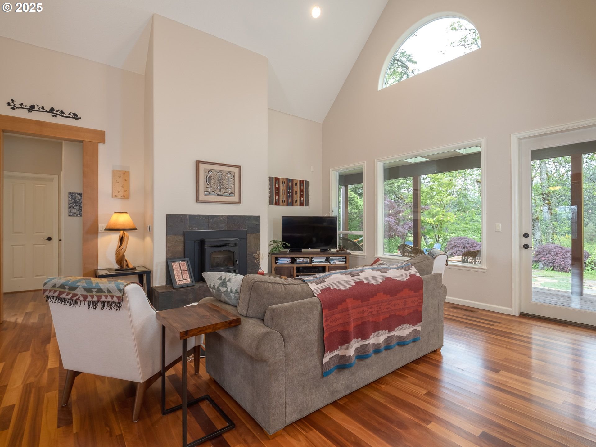 72 Patrick Lane Washougal, WA 98671 - Photo 8 of 48 a living room with furniture a large window and a fireplace