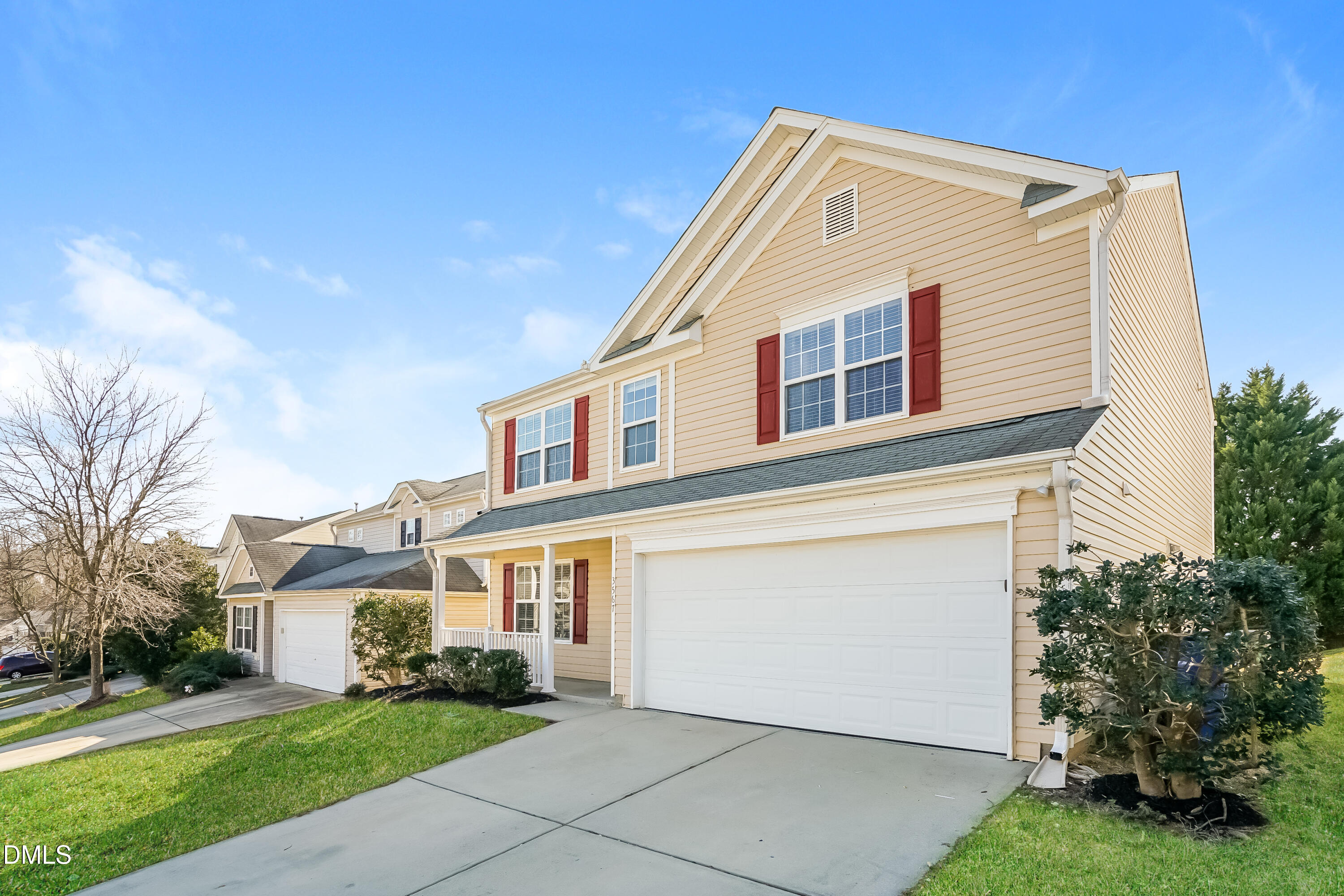 3567 Futura Lane Raleigh, NC 27610 - Photo 3 of 15 a front view of a house with a yard