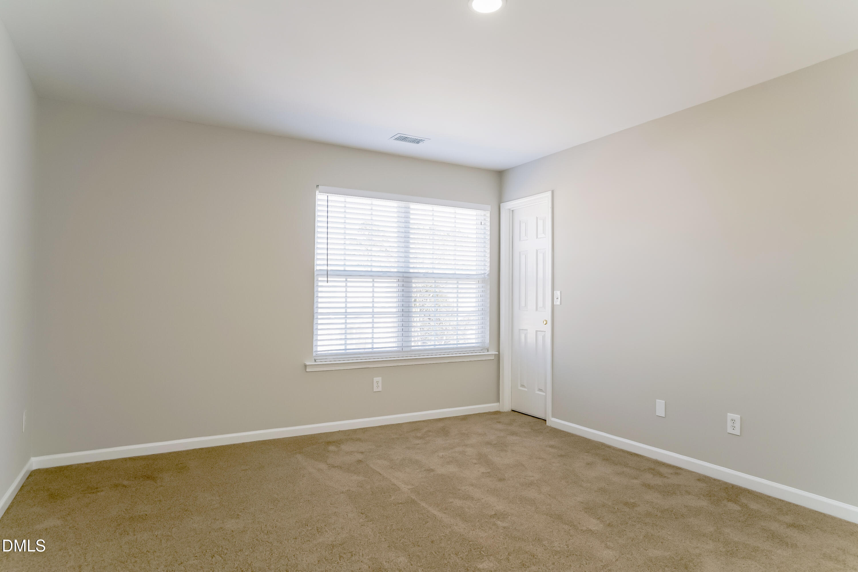 3567 Futura Lane Raleigh, NC 27610 - Photo 9 of 15 an empty room with a window