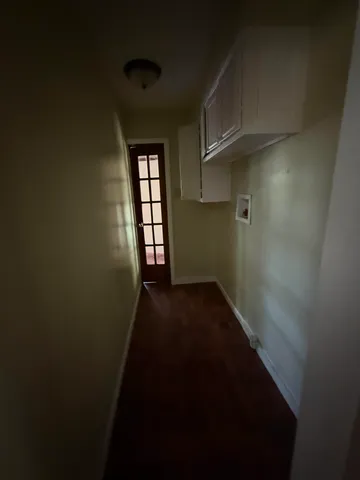 a view of hallway with stairs