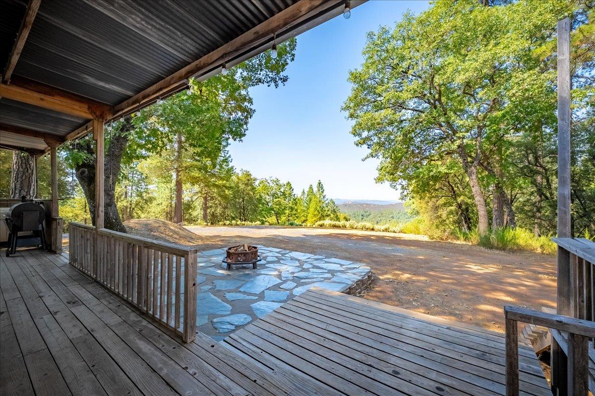 5595 Hackomiller Road Garden Valley, CA 95633 - Photo 18 of 42 a view of a balcony with wooden floor