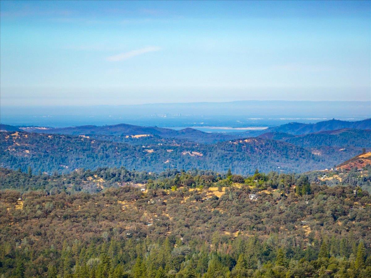 5595 Hackomiller Road Garden Valley, CA 95633 - Photo 5 of 42 an aerial view of residential building and green space