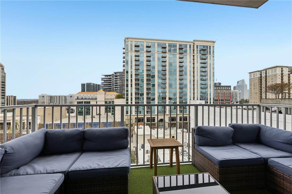 250 Pharr Road Northeast, Unit 1005 Atlanta, GA 30305 - Photo 10 of 25 a balcony view with a couch