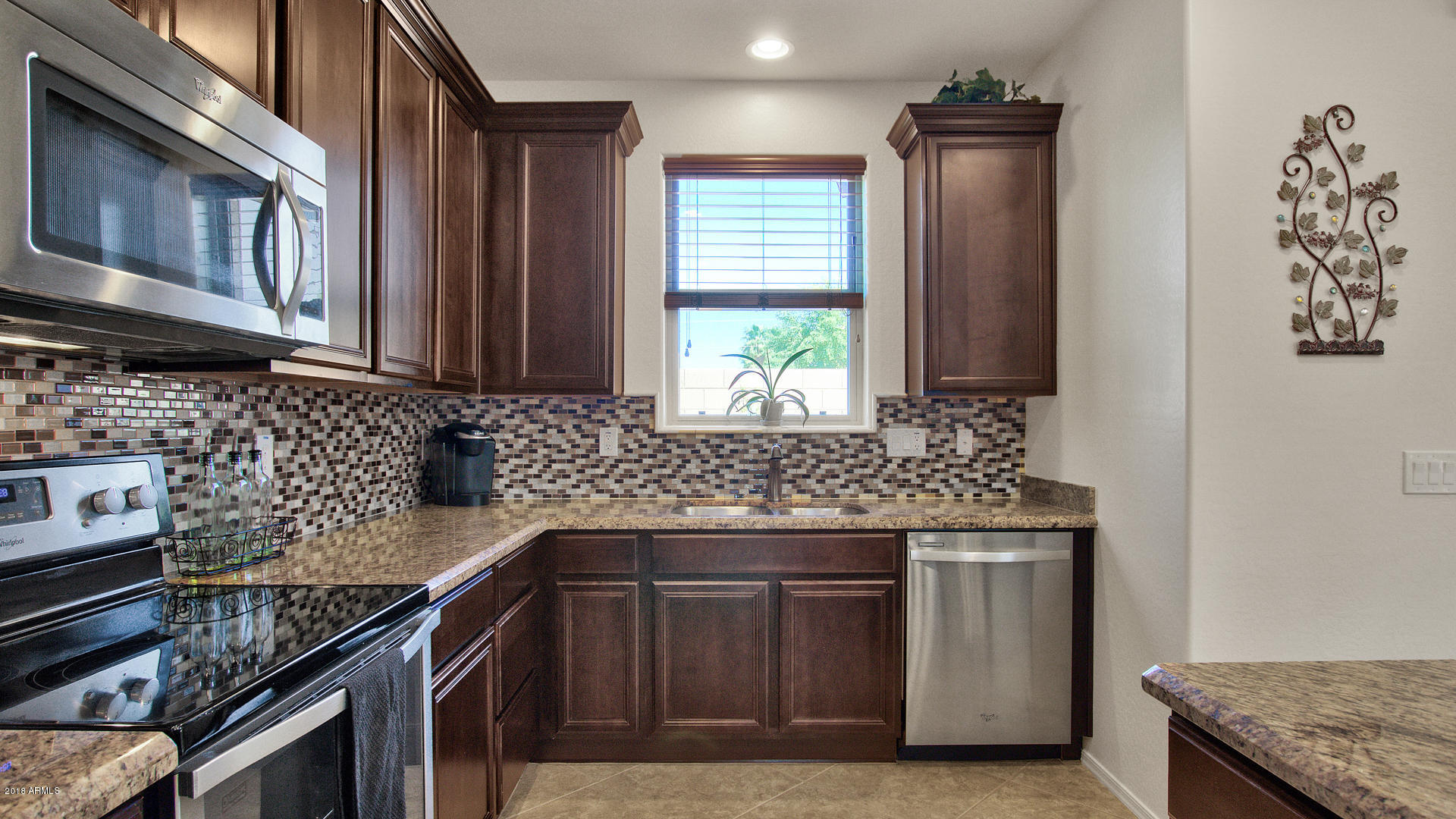 3266 East Rochelle Street Mesa, AZ 85213 - Photo 18 of 35 RICH CABINETRY W/ CROWN MOULDING