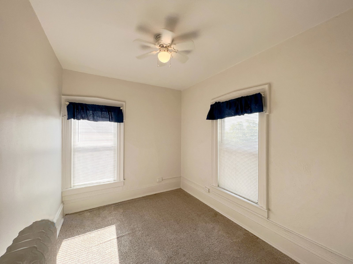 905 4th Street LaSalle, IL 61301 - Photo 13 of 13 an empty room with windows and fan