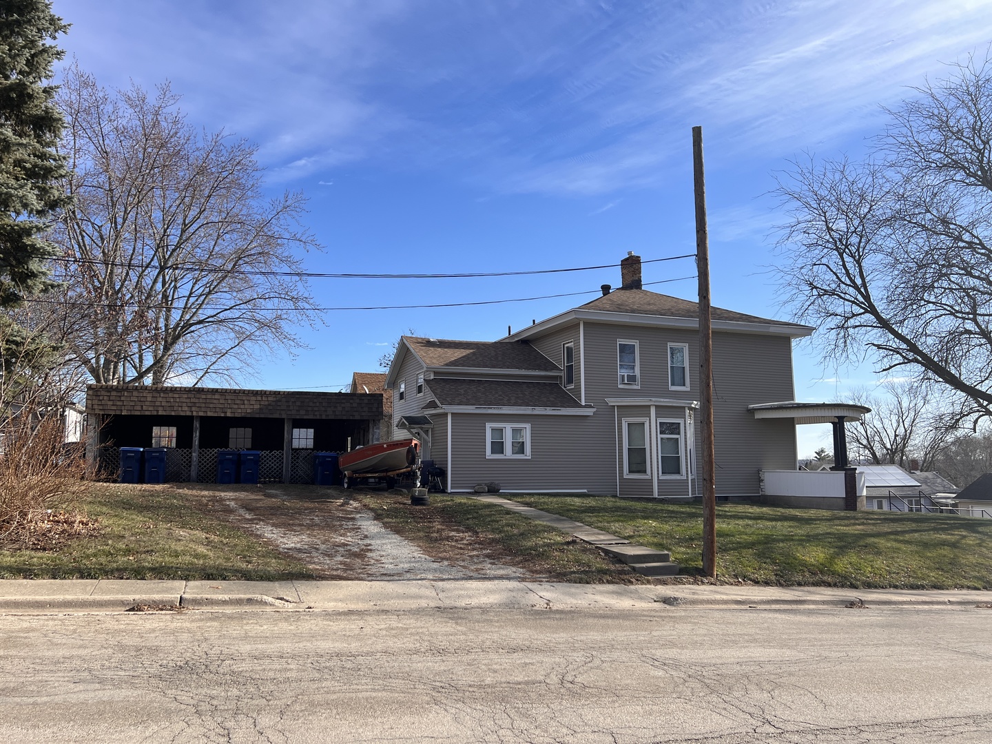 905 4th Street LaSalle, IL 61301 - Photo 2 of 13 a front view of a house with a garden and trees