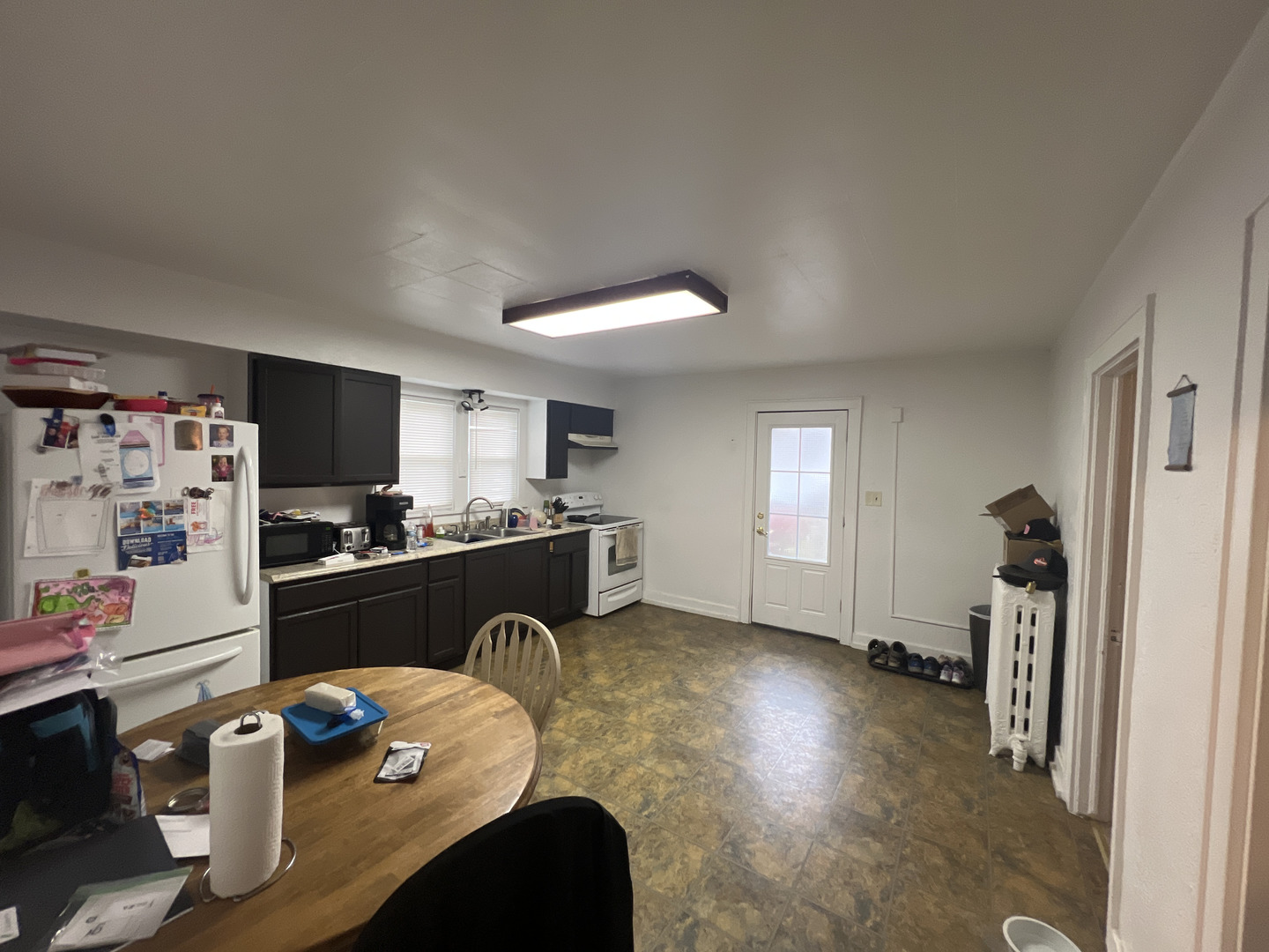 905 4th Street LaSalle, IL 61301 - Photo 3 of 13 a kitchen view with granite countertop lots of clutter and stainless steel appliances