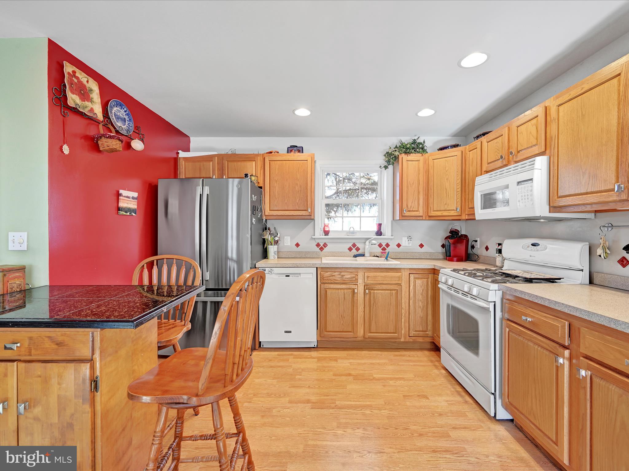 605 Wateredge Road Lititz, PA 17543 - Photo 11 of 29 a kitchen with granite countertop a sink appliances cabinets and furniture