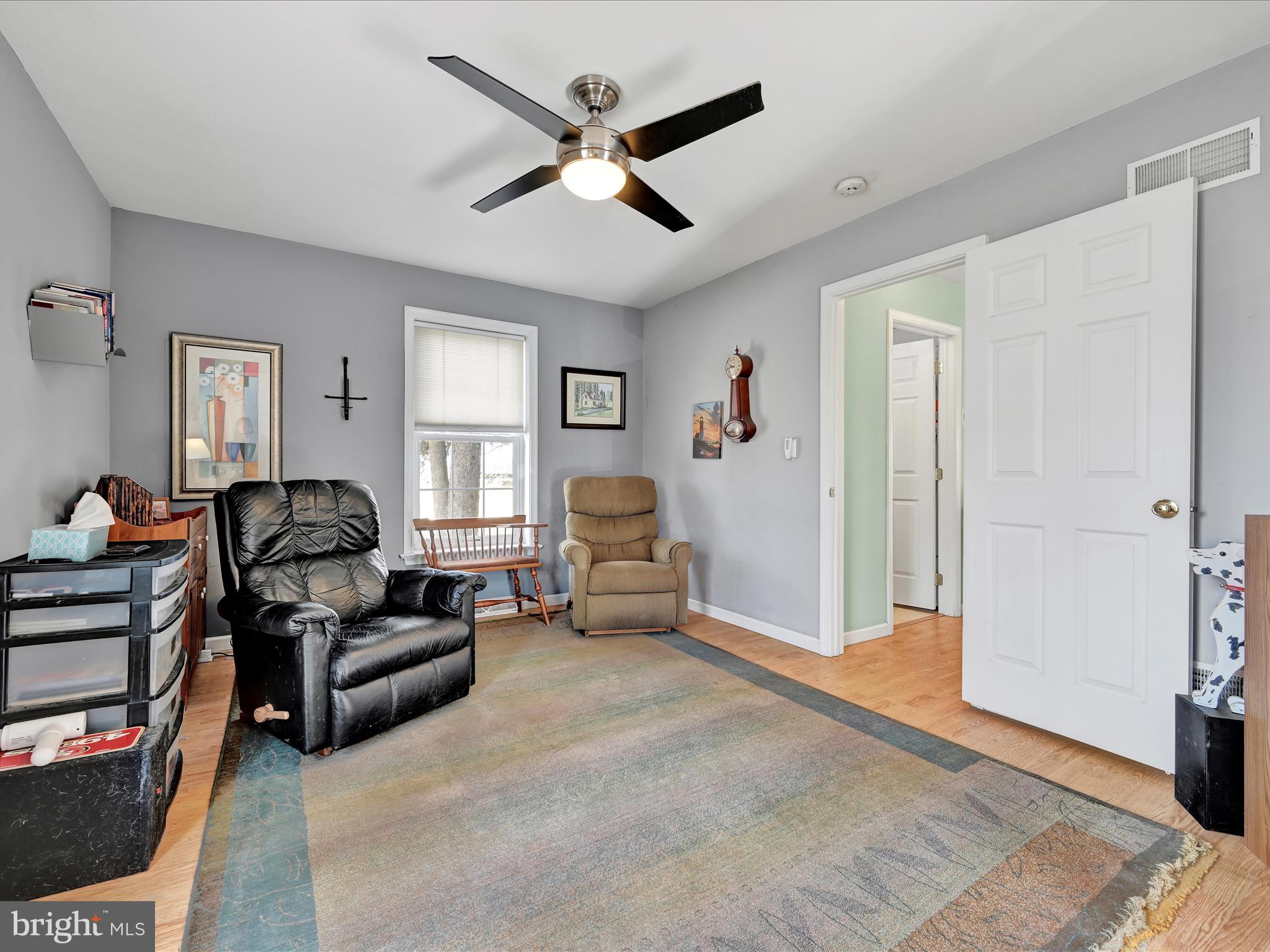 605 Wateredge Road Lititz, PA 17543 - Photo 18 of 29 a living room with furniture and a wooden floor