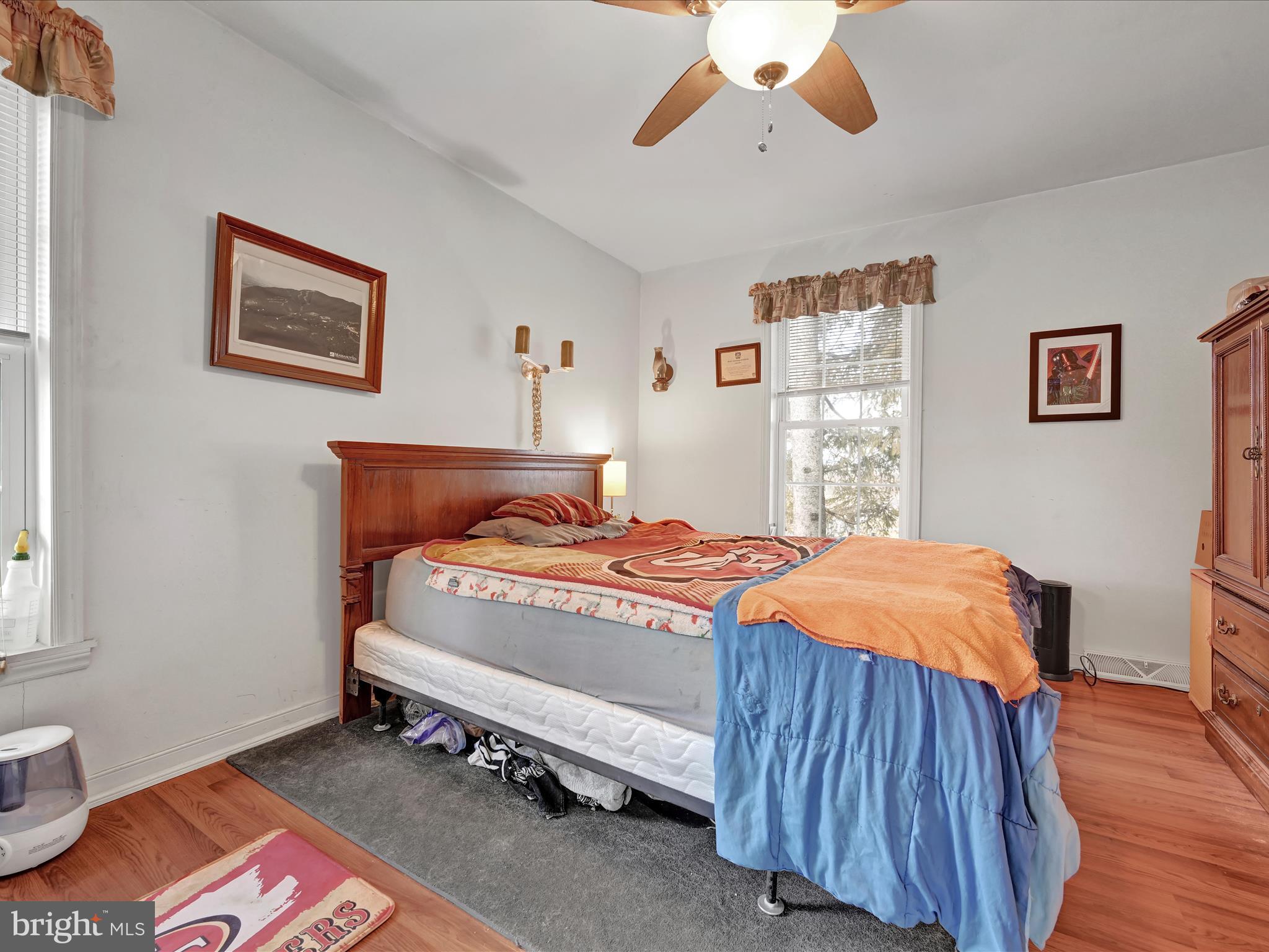 605 Wateredge Road Lititz, PA 17543 - Photo 23 of 29 a bedroom with a bed and wooden floor