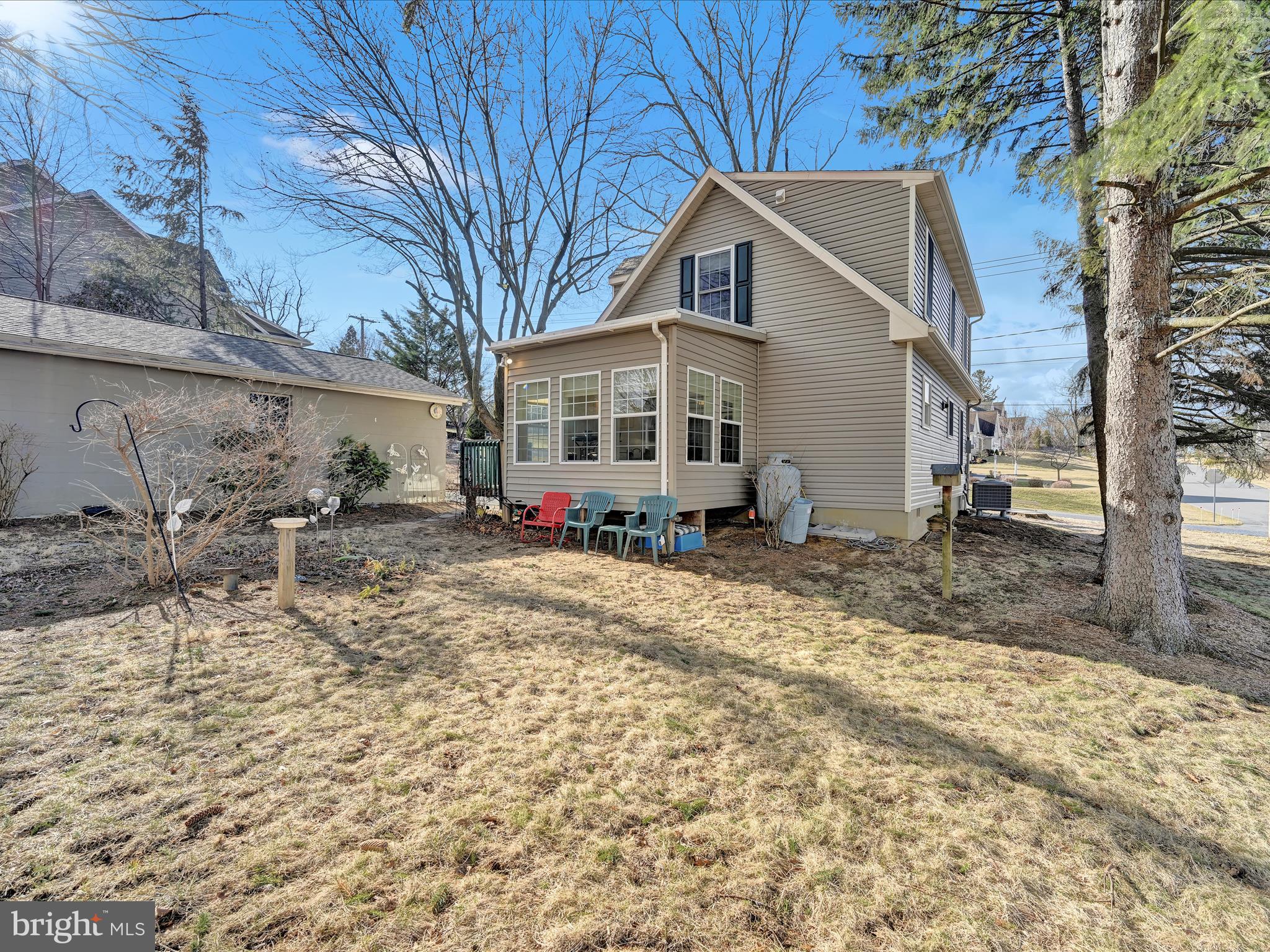 605 Wateredge Road Lititz, PA 17543 - Photo 27 of 29 a view of a yard with a house and sitting area