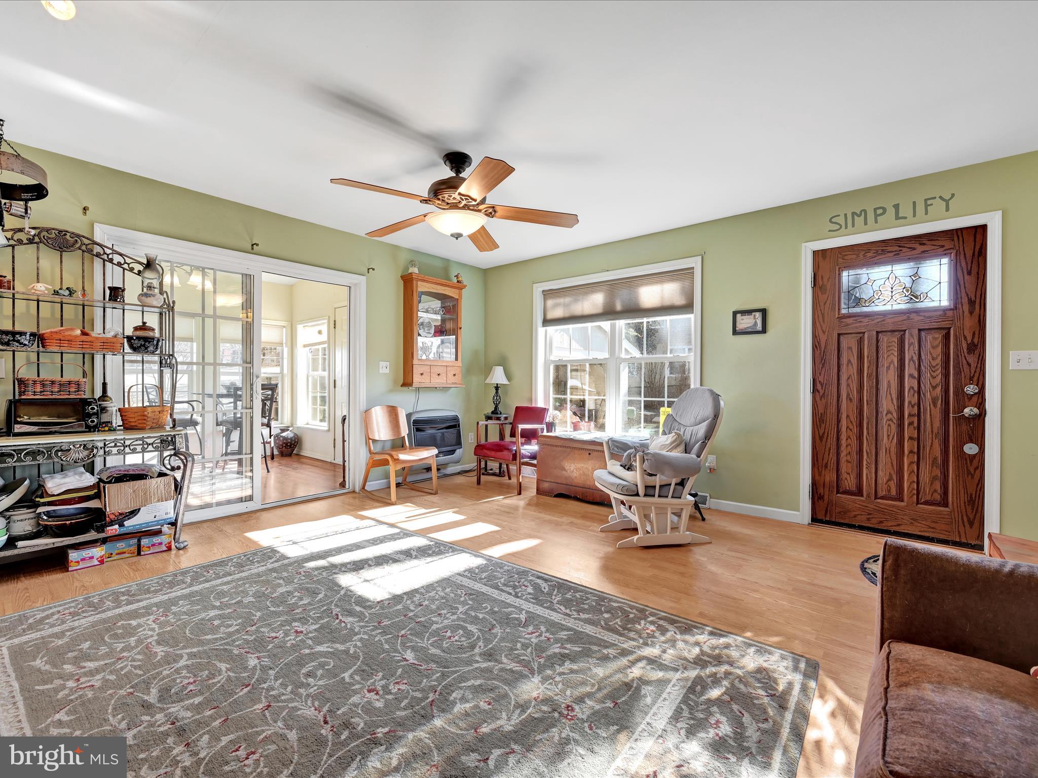 605 Wateredge Road Lititz, PA 17543 - Photo 7 of 29 a living room filled with furniture window and a flat screen tv
