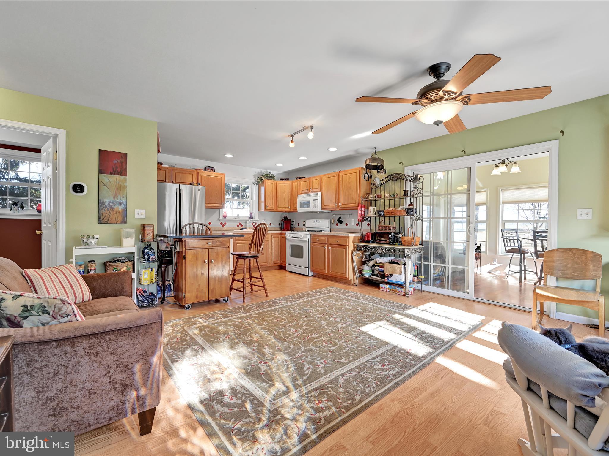 605 Wateredge Road Lititz, PA 17543 - Photo 8 of 29 a living room filled with furniture and a large window