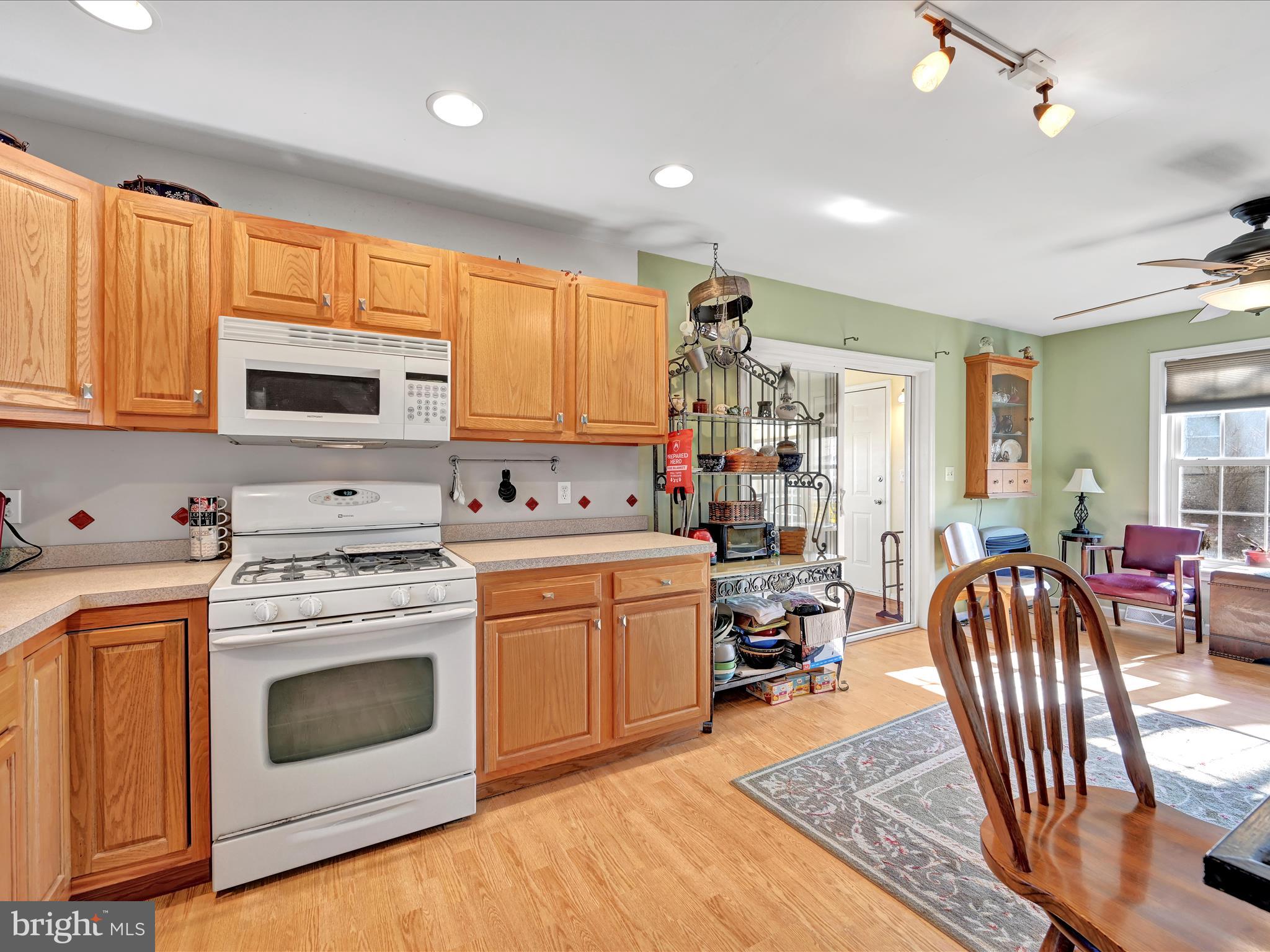 605 Wateredge Road Lititz, PA 17543 - Photo 9 of 29 a kitchen with sink a stove and furniture