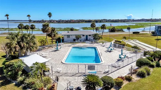 a view of a swimming pool and lake view