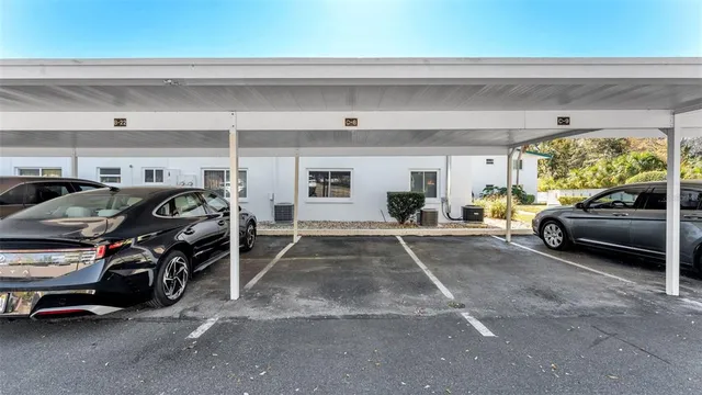 a view of a swimming pool with a house