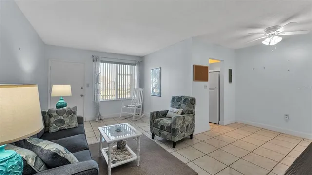 a bed room with furniture and a window