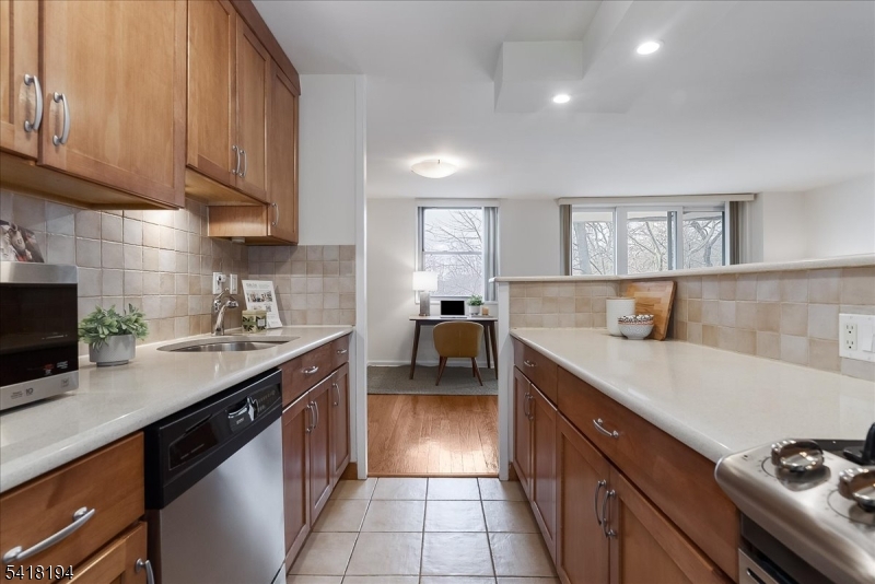 530 Valley Road, Unit 3L Montclair, NJ 07043 - Photo 13 of 25 a kitchen with a sink cabinets and appliances