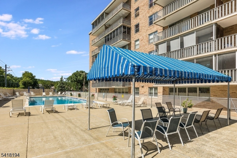 530 Valley Road, Unit 3L Montclair, NJ 07043 - Photo 23 of 25 a patio with table and chairs