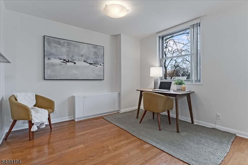 530 Valley Road, Unit 3L Montclair, NJ 07043 - Photo 7 of 25 a workspace with furniture and a window