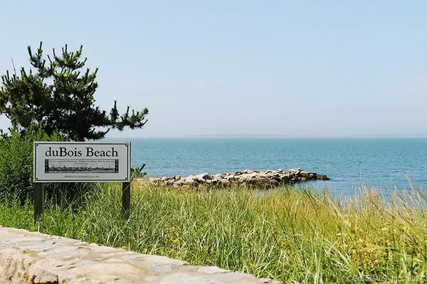 a sign that is on the side of a road