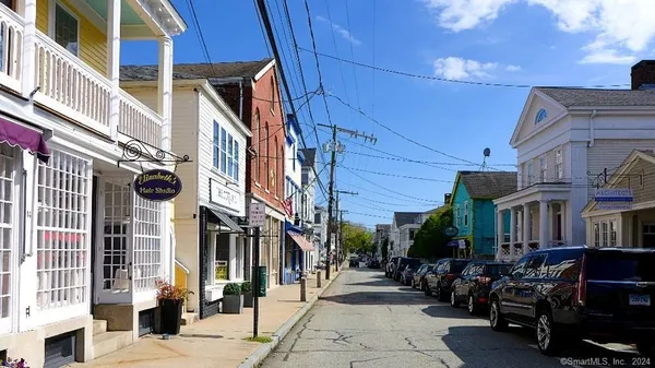 a view of a building with sitting area