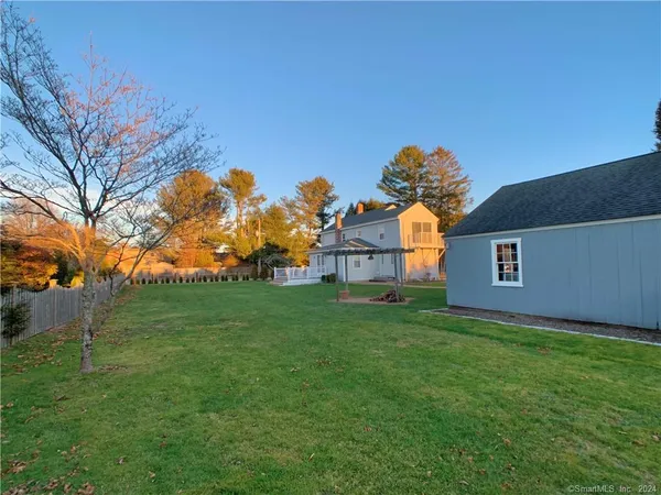 a backyard of a house with lots of green space