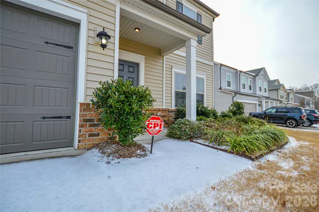 a view of a house with a street