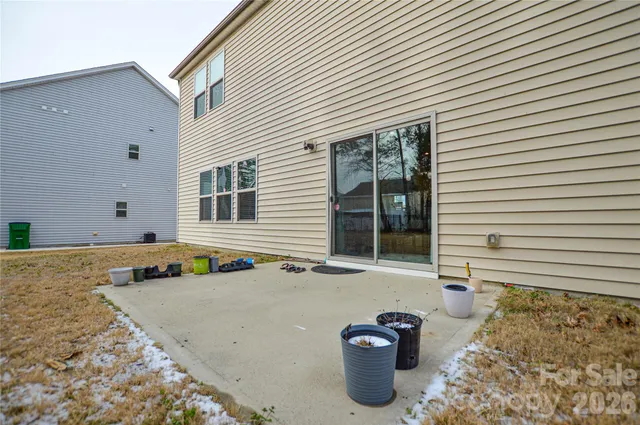 a view of a back yard of the house