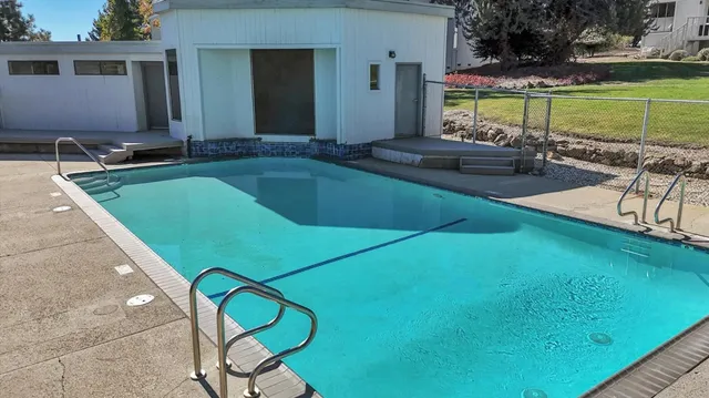 a large brick building with a large windows