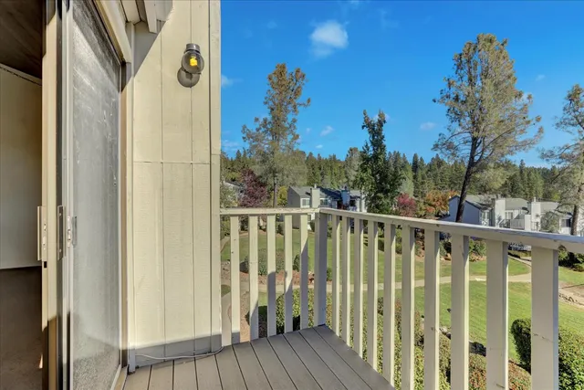 a view of a balcony with an outdoor space