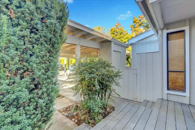 a yellow house with outdoor space