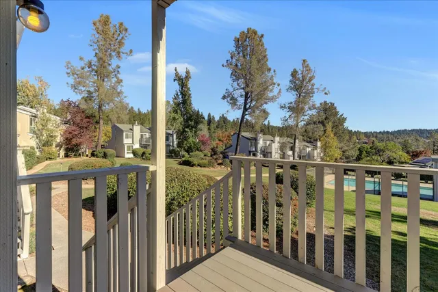 a view of a balcony with an outdoor space