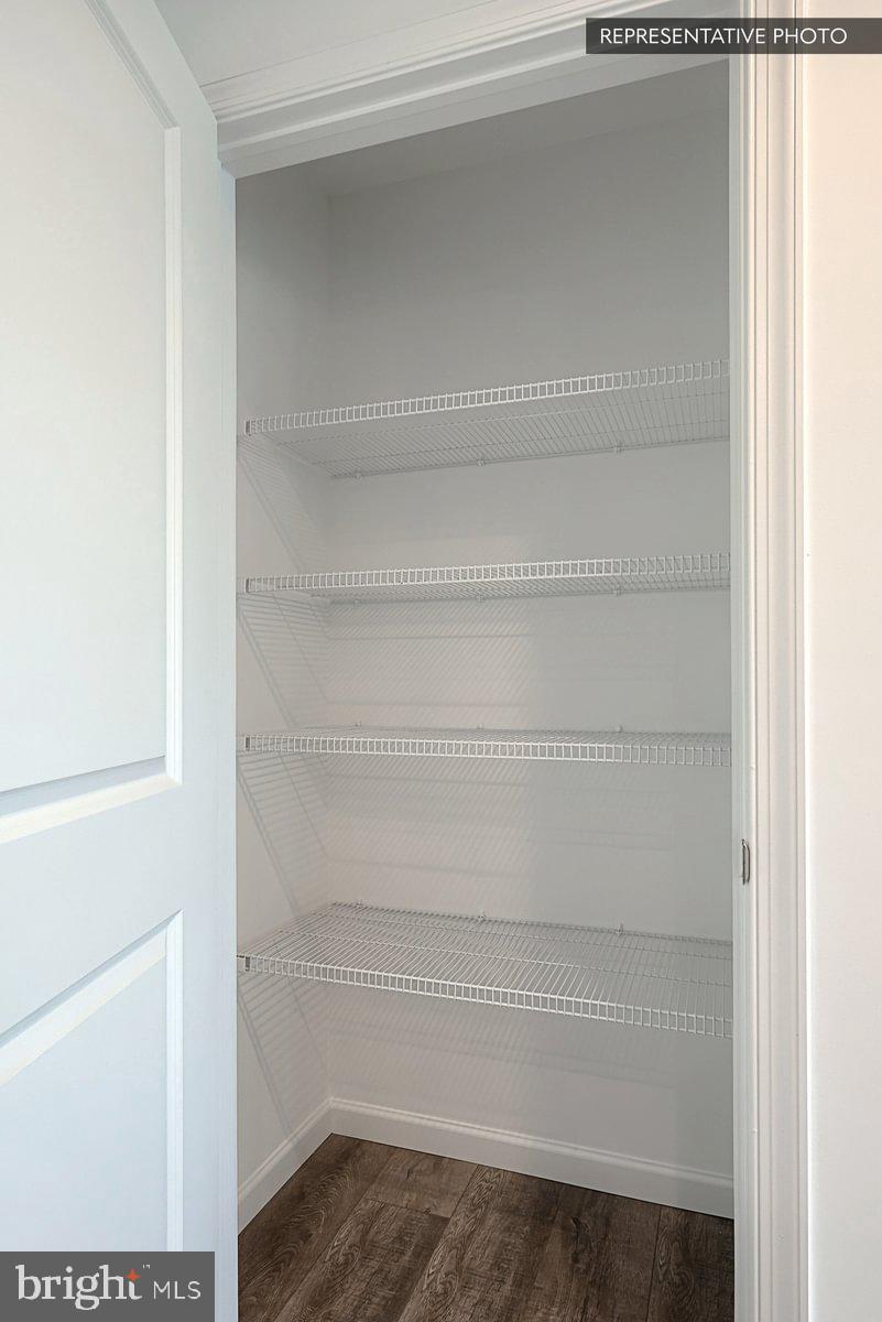 243 Abercorn Street State College, PA 16803 - Photo 15 of 21 a view of walk in closet with empty racks