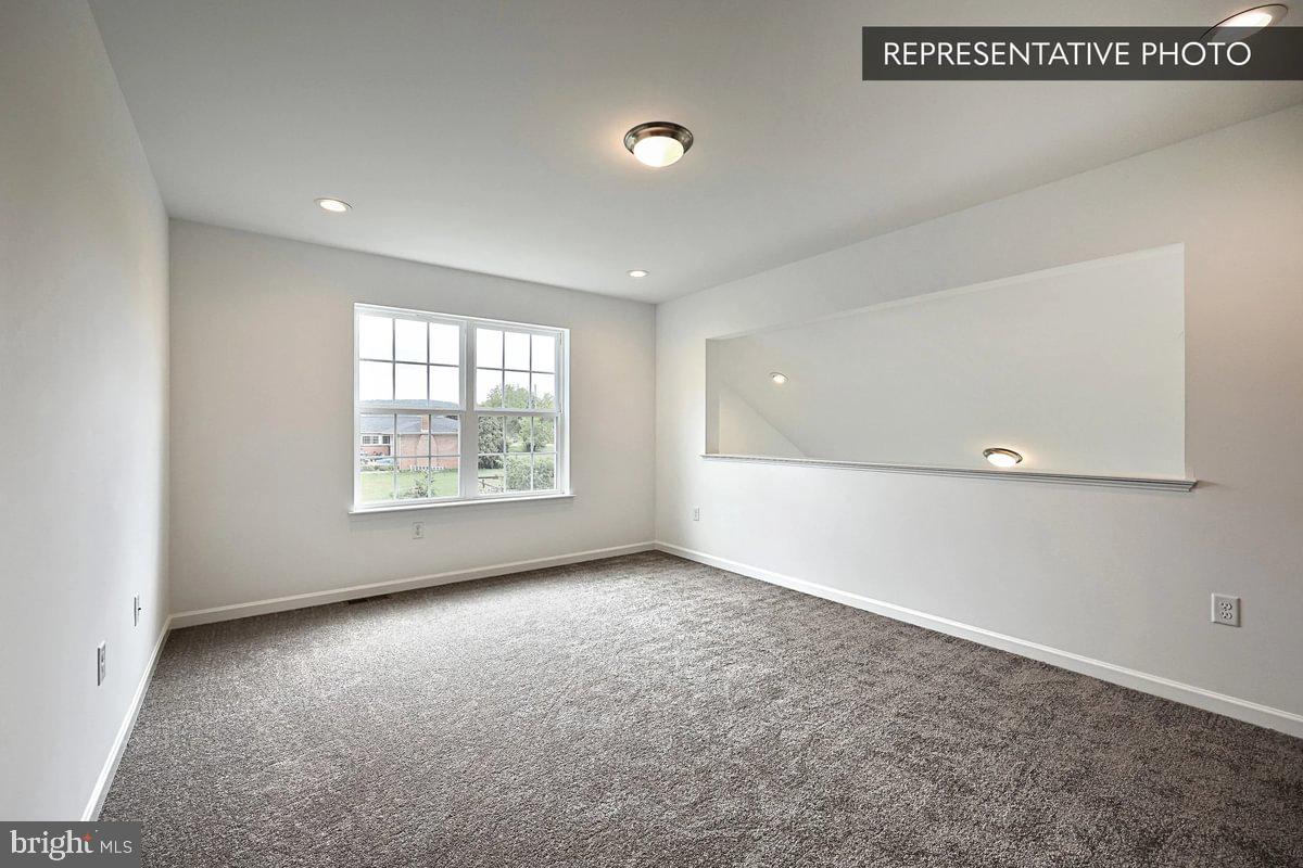 243 Abercorn Street State College, PA 16803 - Photo 18 of 21 an empty room with windows