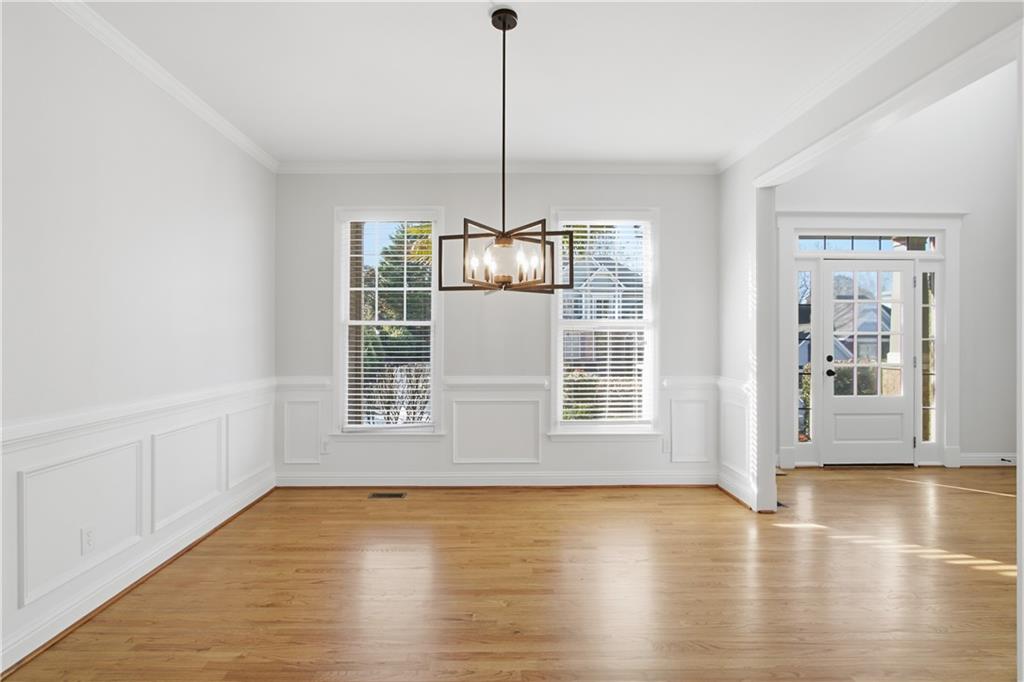 511 Highwater Pass Canton, GA 30114 - Photo 11 of 39 a view of empty room with wooden floor and fan