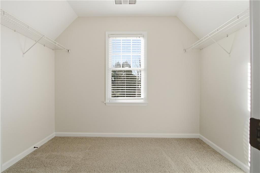 511 Highwater Pass Canton, GA 30114 - Photo 17 of 39 a view of an empty room with a window