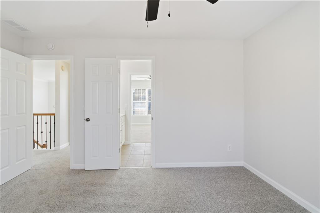 511 Highwater Pass Canton, GA 30114 - Photo 20 of 39 an empty room with windows