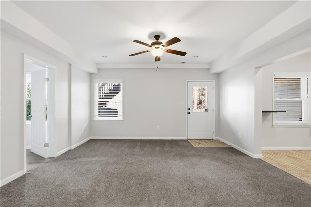 511 Highwater Pass Canton, GA 30114 - Photo 36 of 39 wooden floor in an empty room with a window