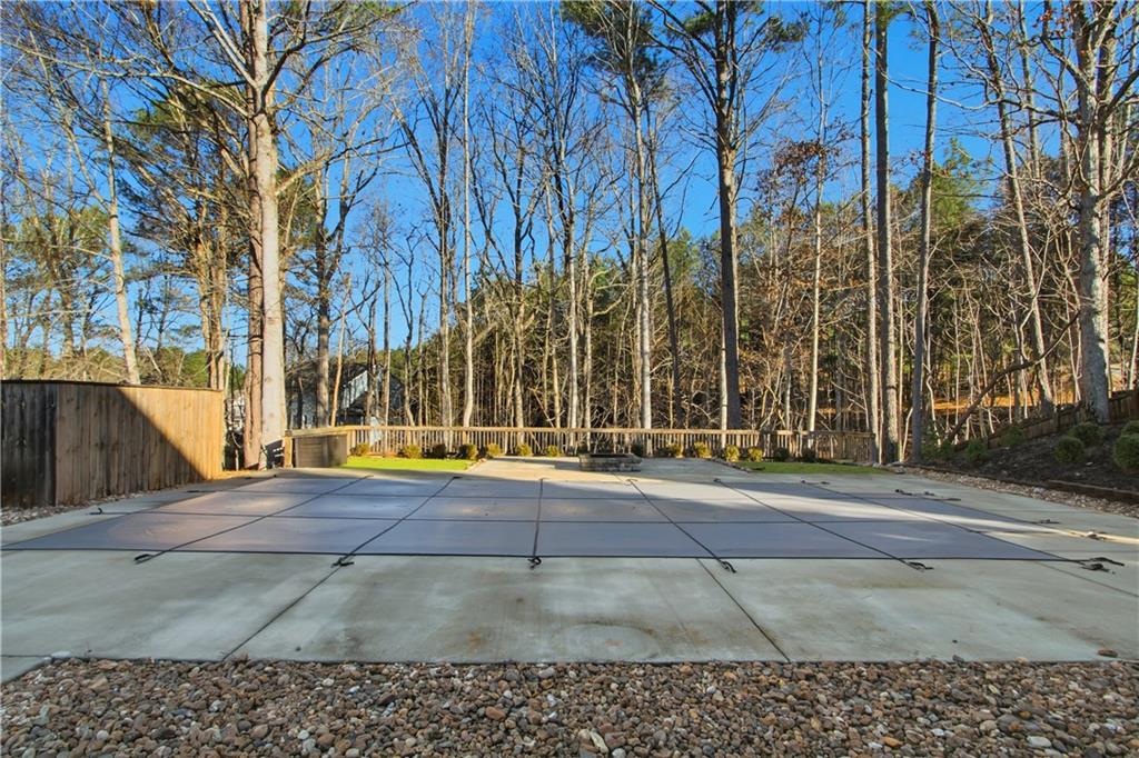 511 Highwater Pass Canton, GA 30114 - Photo 39 of 39 a view of backyard with large trees