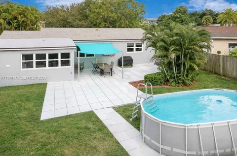 a view of outdoor space yard and swimming pool