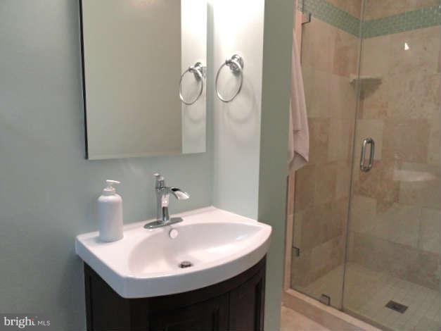 206 Ridgefield Road Lutherville-Timonium, MD 21093 - Photo 14 of 30 Renovated master bathroom with tiled shower